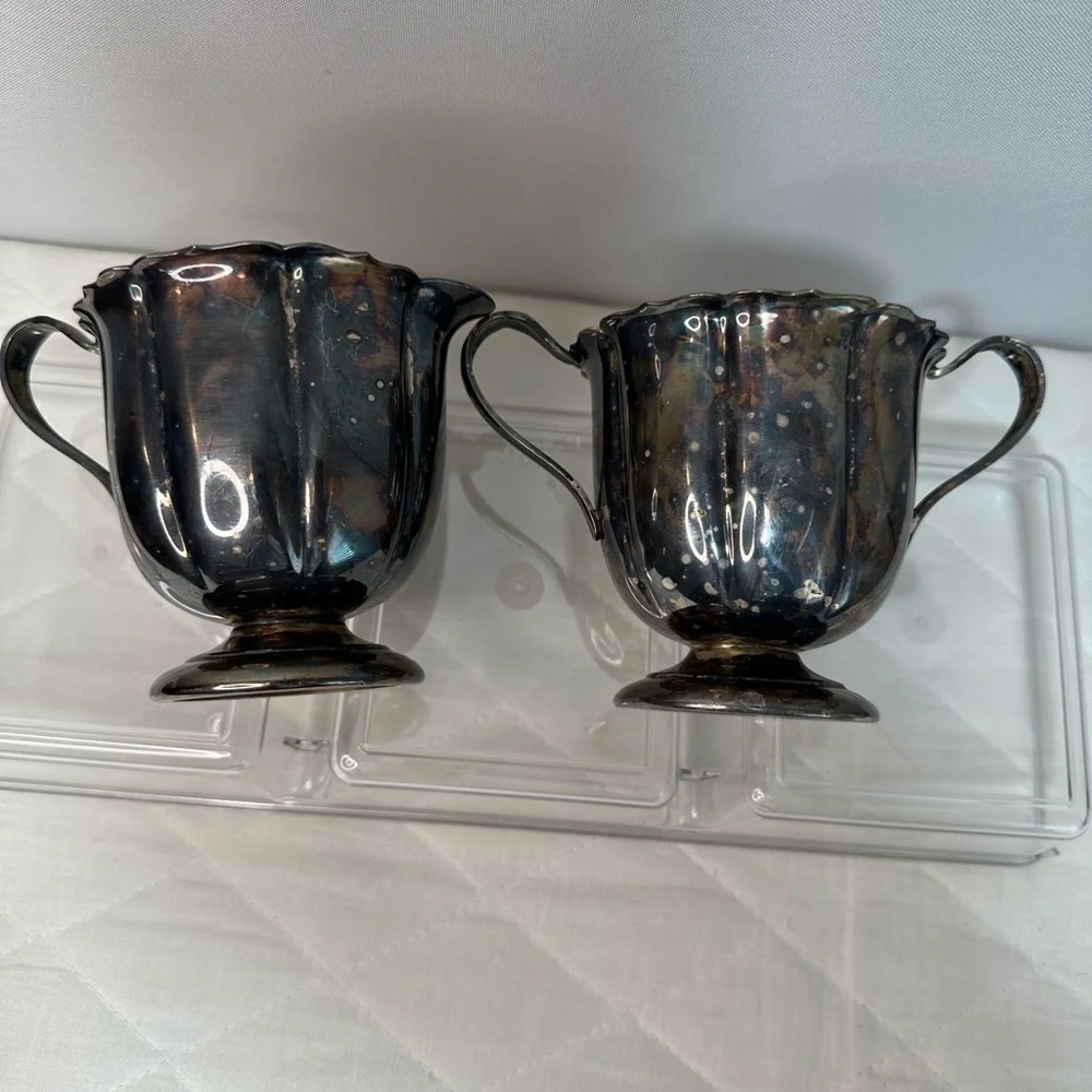 I gave Early American International Company Sugar And Cream Set Silver Plated